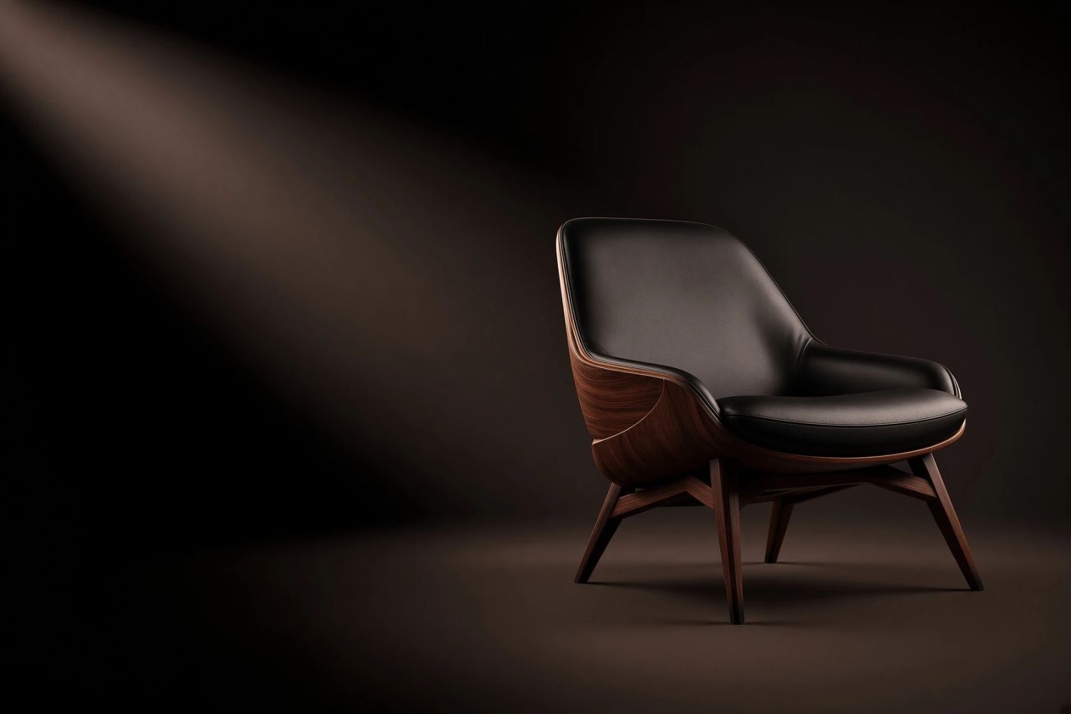 The lounge chair in near-darkness with a single shaft of light across it